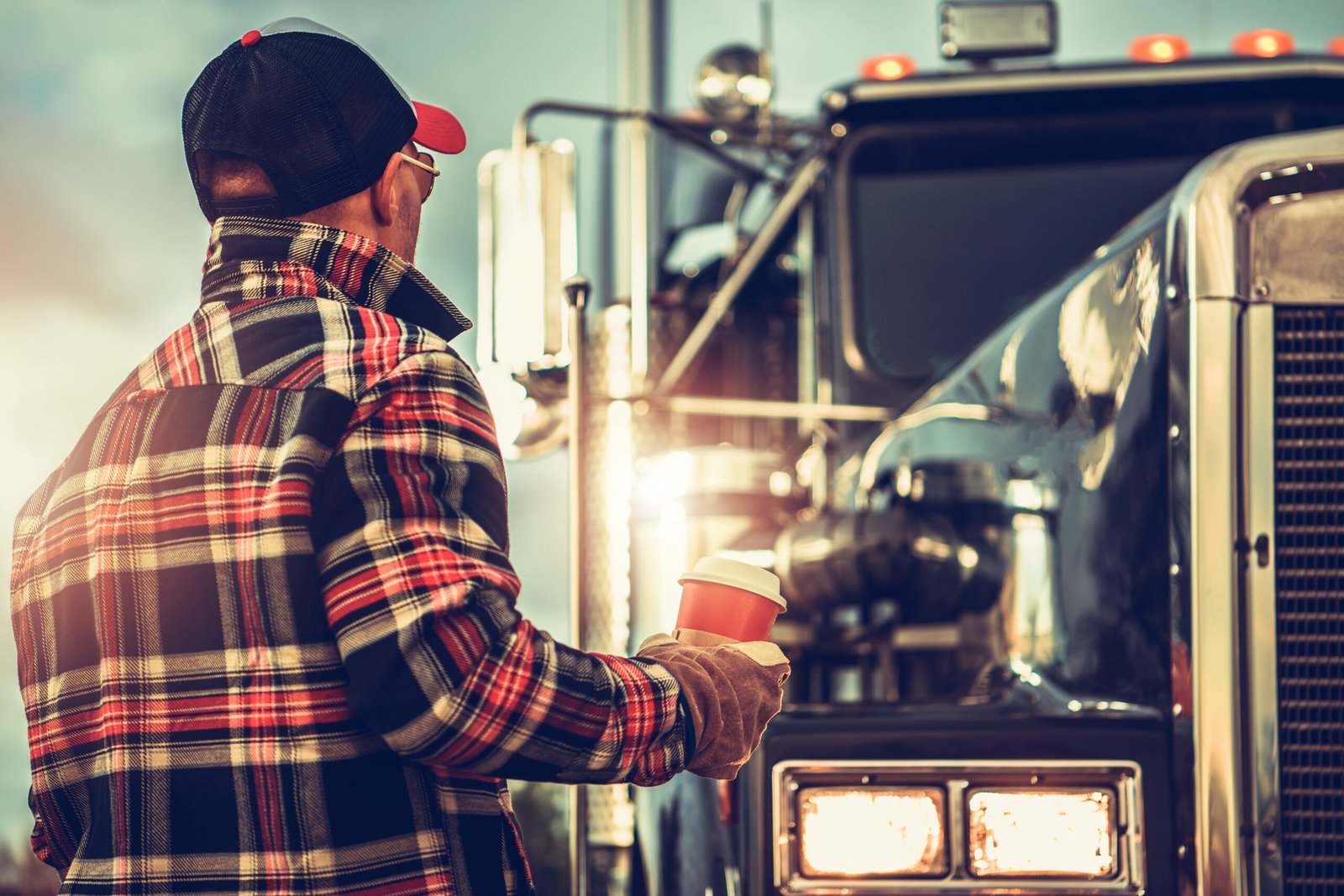 Semi Truck Driver Getting Ready For His Job Finishing His Cup of