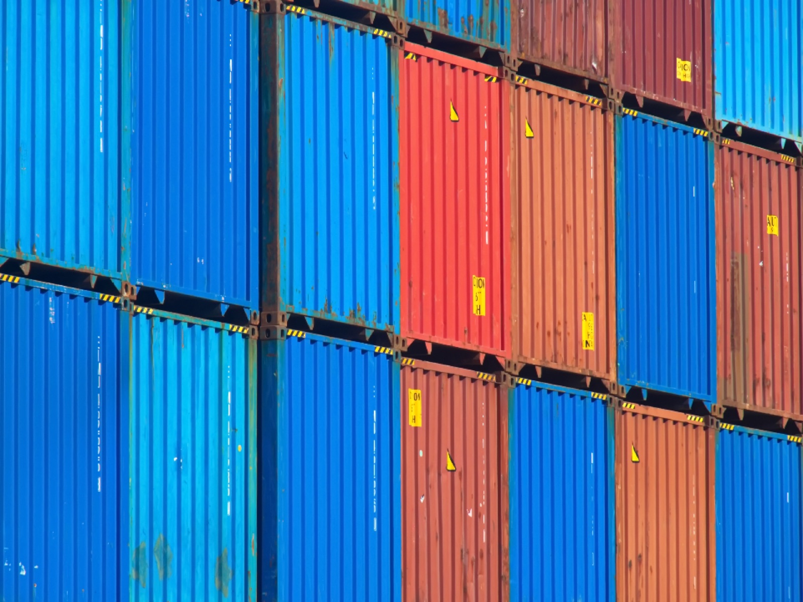 Containers stacked at the terminal, waiting to be drayed
